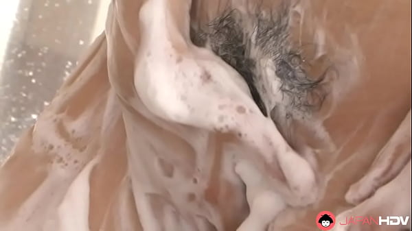 Japanese Emiko Koike solo masturbates in the bathroom uncensored.