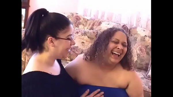 Chubby lesbians fuck on the floor with big dildos