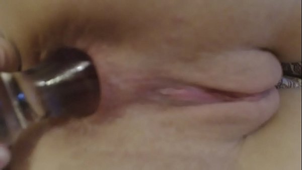 Ass stretching with ass plug.
