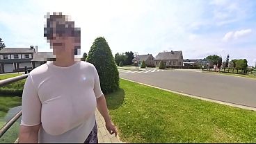 I'm walking in the street braless in transparent shirt.