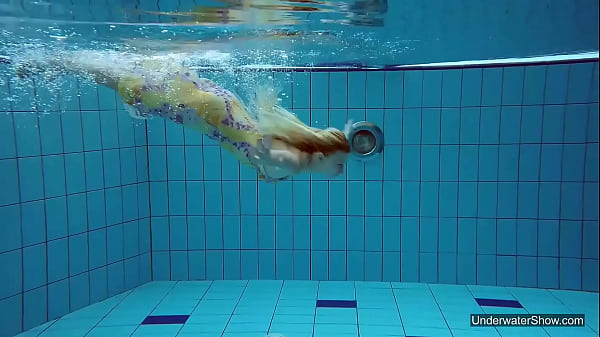Sexiest brunette teen Milana Voda swimming in pool