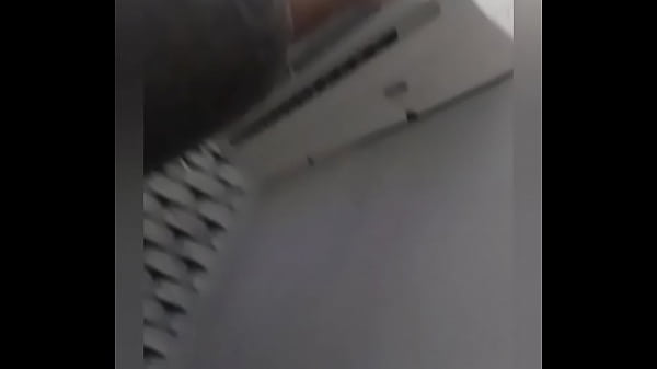 Pamela Ferrary messing with the air conditioning technician