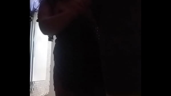 Pamela Ferrary messing with the air conditioning technician