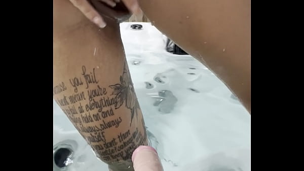 Riding dildo in my jacuzzi