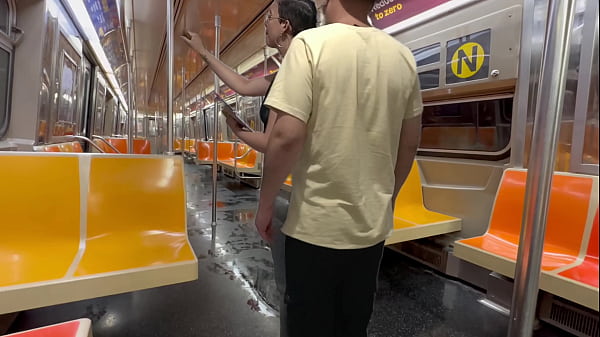 Student girl gets cum on New York subway train.