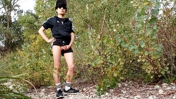 Download Video - Cute twink Jon Arteen wears black Adidas outfit&comma; shows his underwear&comma; walks freeballing&comma; jerking off throught his short shorts&comma; cumming outdoor
