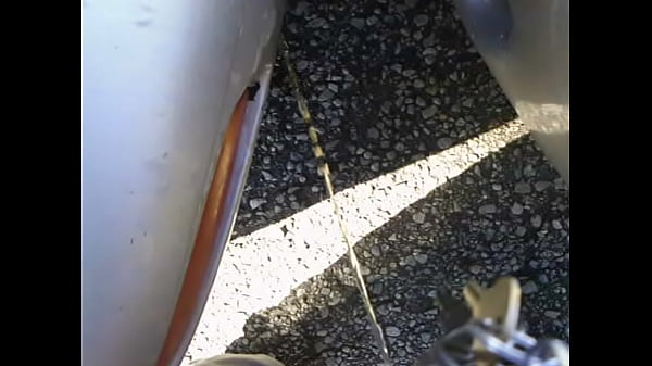 Download Video - Pissing between two cars