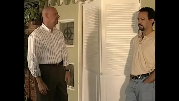 Bald private detective examines an important witness Lena Ramon on the summer table