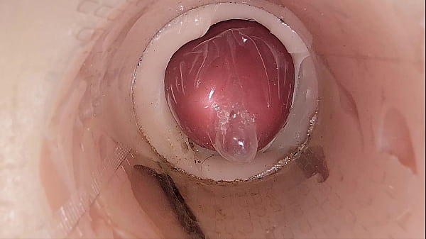 thumb the camera in the deep pussy records a huge ejaculation of sperm into the condom