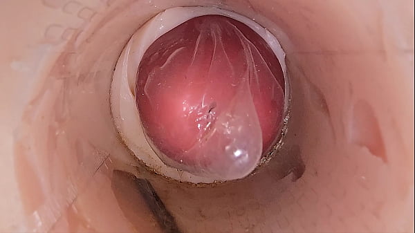 thumb the camera in the deep pussy records a huge ejaculation of sperm into the condom
