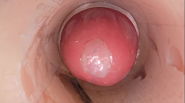 thumb the camera in the deep pussy records a huge ejaculation of sperm into the condom