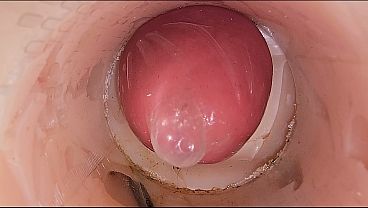 The camera in the deep pussy records a huge ejaculation of sperm into the condom