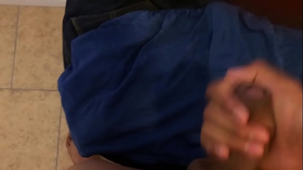 Masturbating