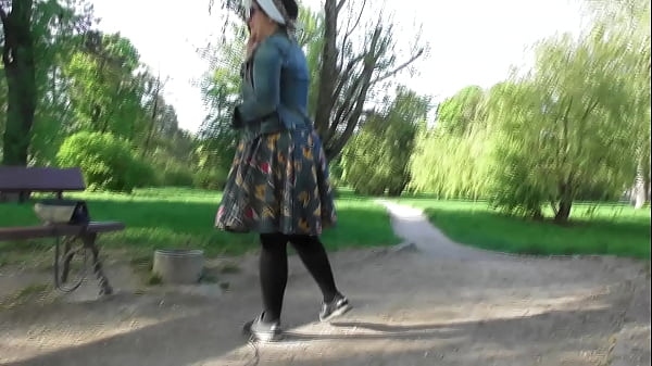 Hairy mature in transparent dress flashing in the park