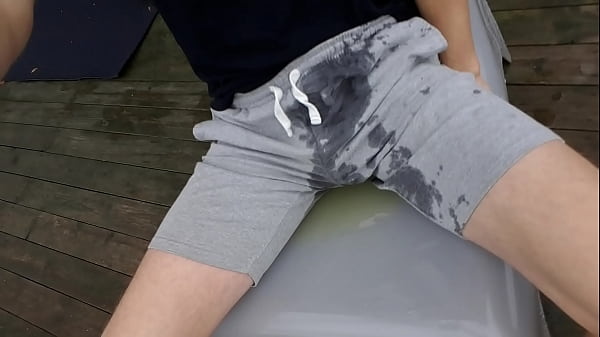 Download Video - Pissing in bermuda shorts outside hotel
