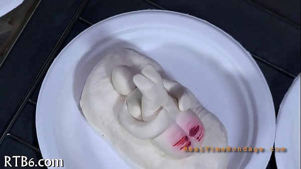Tormenting babe's vagina with toy