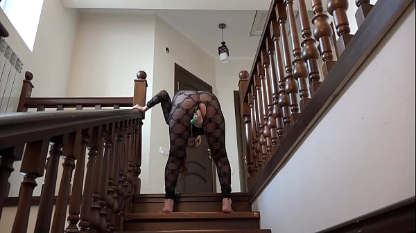 Walking beautiful butt with anal beads inside the anus. Busty milf with hairy pussy and big tits masturbates on the stairs. Amateur fetish.