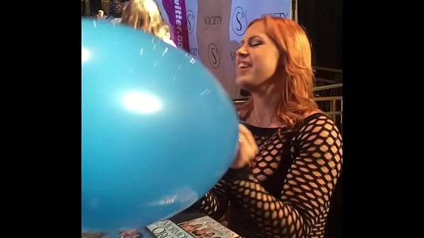 Edyn Blair blows up a giant balloon