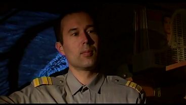 This milf gets banged in her cell by the guard while his colleague watches