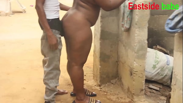 African married man sneaking on her neighbour while bathing outside