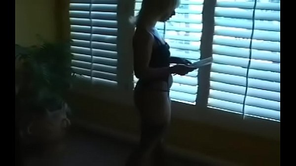 Tempting chick popping balloons with her cigarette