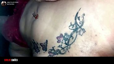 An attractive brunette woman has sex with her lover in the living room.