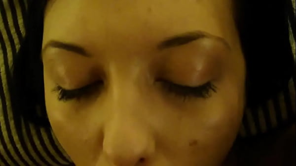 Cumshot on the brunette's face