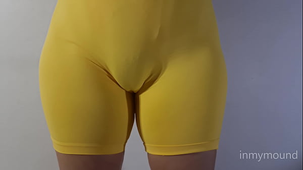 Look at that beautiful beetle hood with vacuum packed leggings and then the pussy shows itself all over.