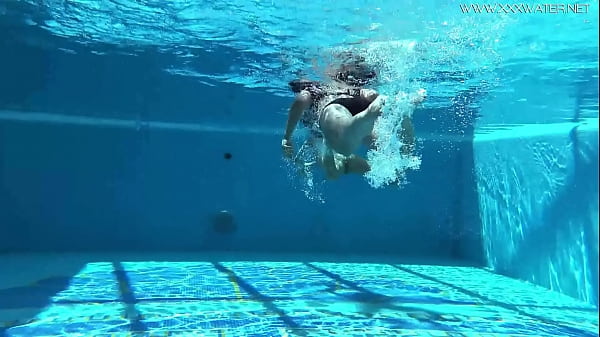 Jessica and Lindsay swim naked in the pool