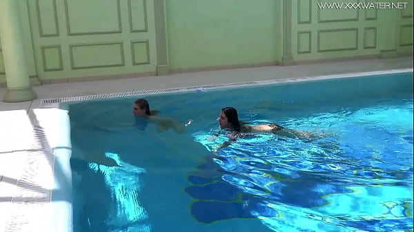 Jessica and Lindsay swim naked in the pool