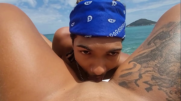 Hot tattooed girl gives it up without a condom to Joao the naughty guy on a nudist beach in Rio de Janeiro, Brazil.