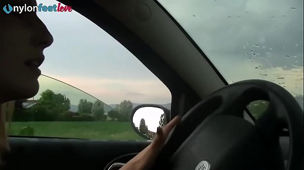 Download Video - Sexy redhead stockings upskirt and shoeplay on the driveway