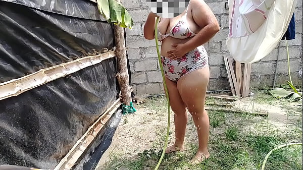 Amazing horny stepmom bathes in a lonely place and touches her pussy very richly.