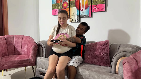 I see my little dwarf stepbrother playing with his cell phone and I tell him to show me, the horny little thing gets excited and ends up splitting my pregnant pussy with his huge cock.