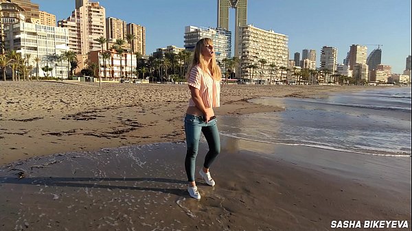 Download Video - Wet shoot on a public beach with Crazy Model&period; Risky outdoor masturbation&period; Foot fetish&period; Pee in jeans&period;