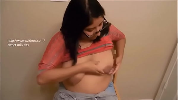 Mommy gives herself a breast message.