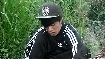 Download Video - Cute Asian gay twink in a black-and-white adidas tracksuit and Campus sneakers masturbates and cums outdoors
