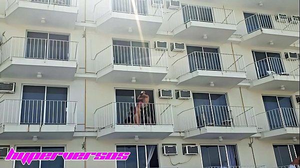Hot couple starts to fuck on the balcony of the hotel in Acapulco, the waitress notices it and doesn't say anything to them