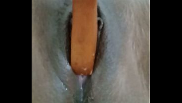 Horny girl fucks her juicy pussy close-up creamy