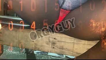 Flashing red thong at a beach resort