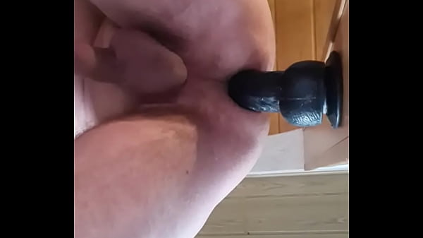 Father's dildo assfuck in the doorframe