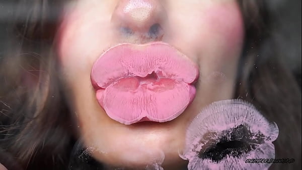 Sensual creamy pink lipgloss kiss