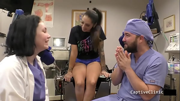Stefania Mafra Is Brought To The Remote Interrogation Center Where Officer Tampa & Nurse Lenna Lux Will Torment This Helpess Latina While Stefania's BF Watches! Full 1  Hour Movie Only At BondageClinic! Reup