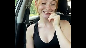 Girl recording a TikTok in the car