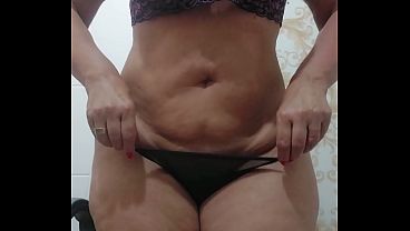 Dancing in lingerie, shaking her big booty and winking her little asshole