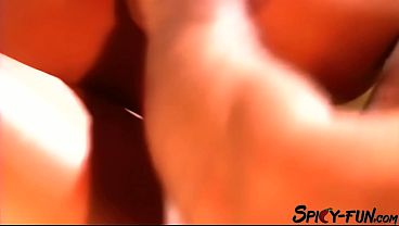 A model enjoys being penetrated in both holes in this old video.