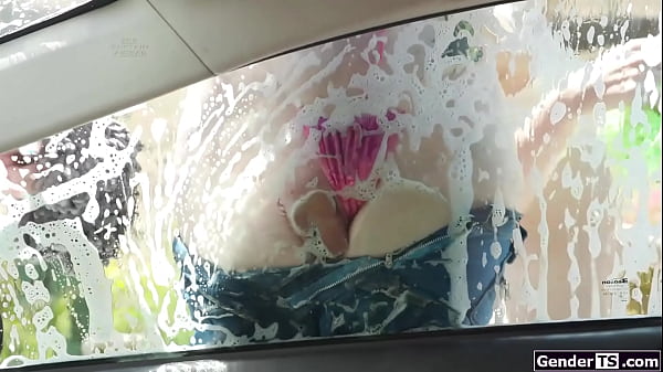 These two super sexy tgirls want to wash more than just cars