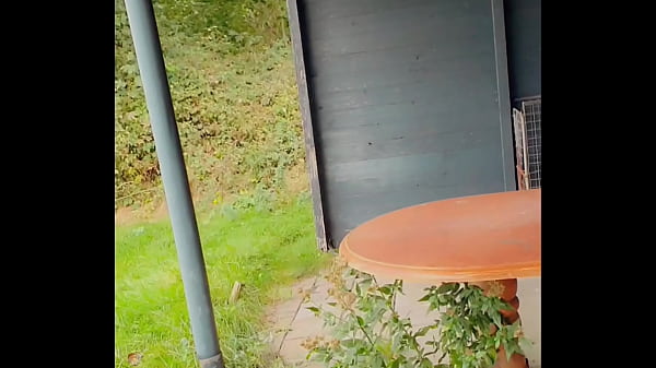 Download Video - Annemieke playing in front of abandoned restaurant