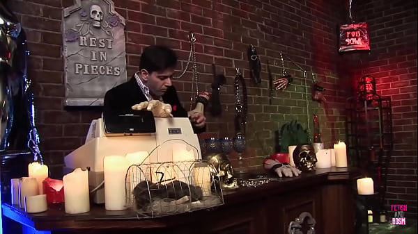 A blonde brings her boyfriend to a BDSM shop and fucks him and the salesman