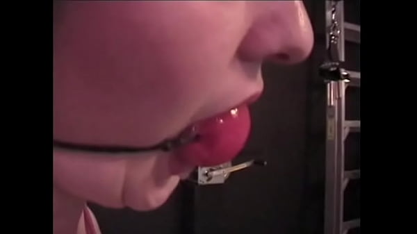 Download Video - Bound and silenced BDSM skank loves having her tits roped up in the basement